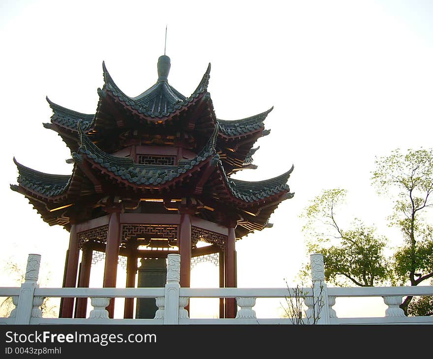 Chinese ancient attic and marble parapet with trees. Chinese ancient attic and marble parapet with trees