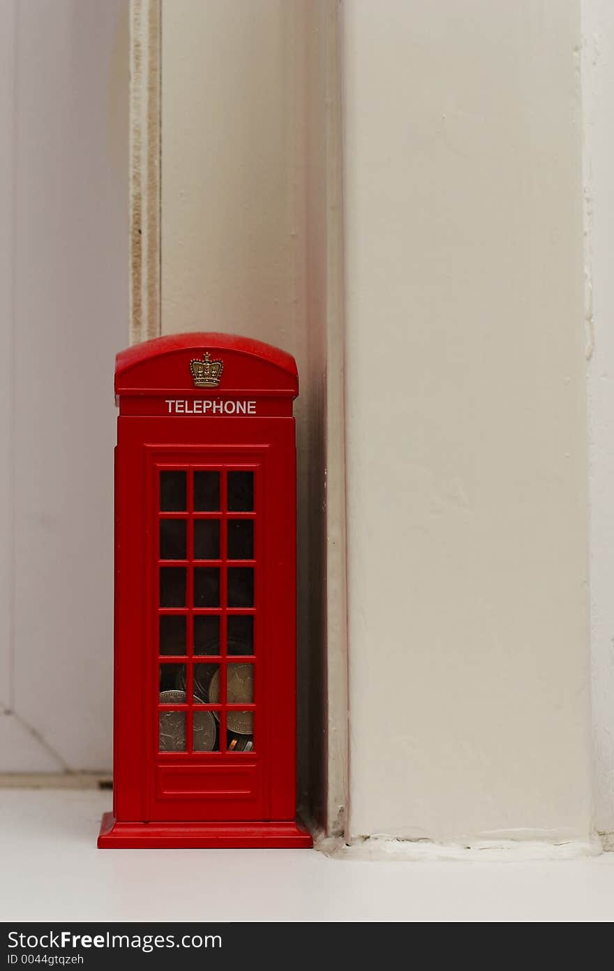 Mini red phonebooth (originally a coin place)