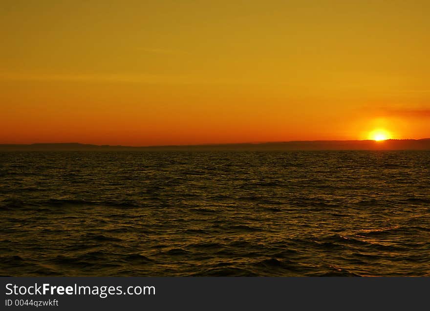 Colorful sunset reflectin in the ocean. Colorful sunset reflectin in the ocean.