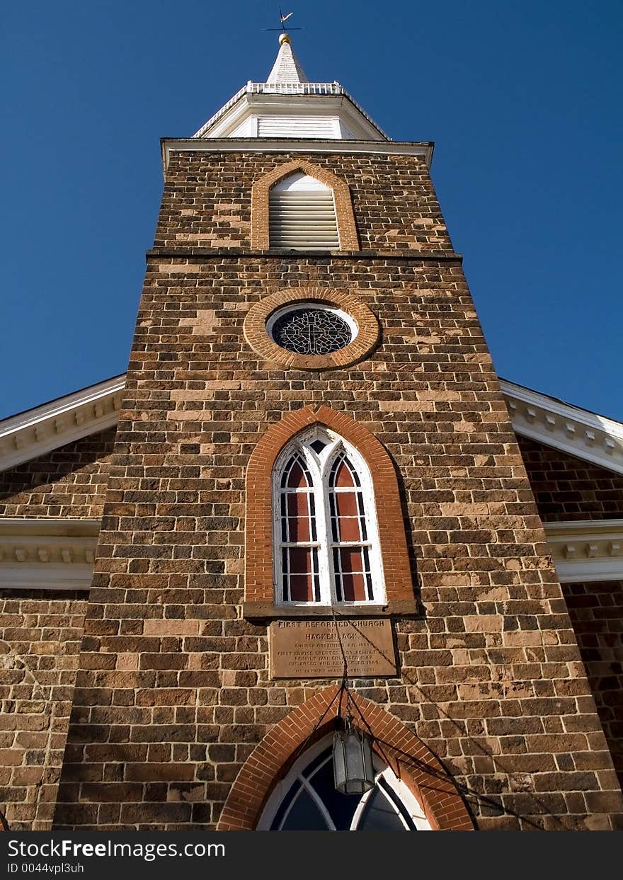 This is a perspective shot of an old stone church in Hackensack New Jersey.