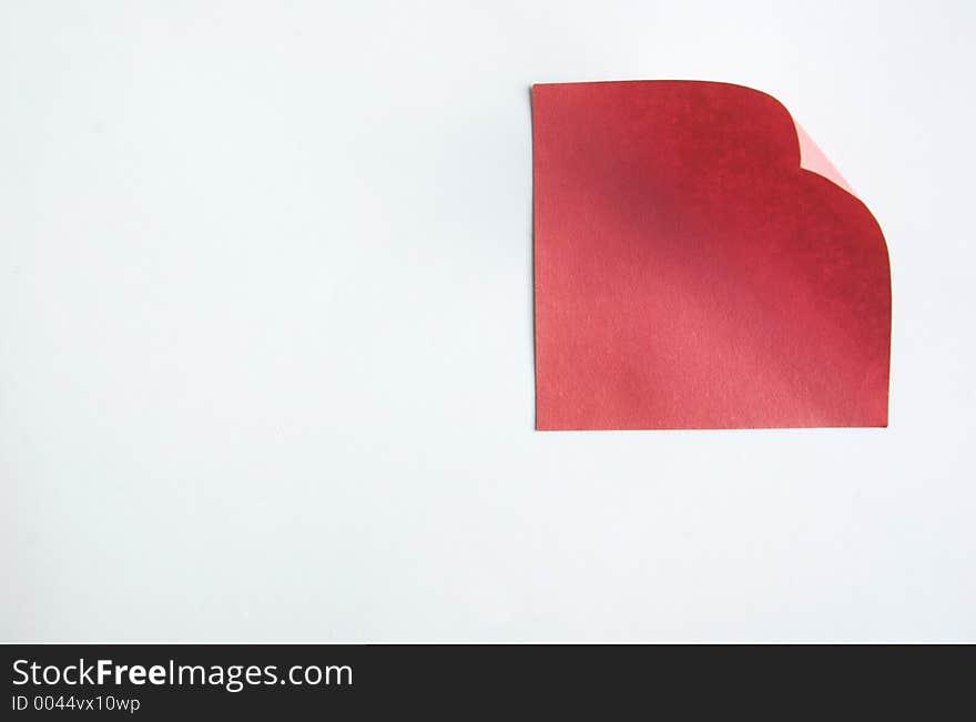 Red note isolated in a white background