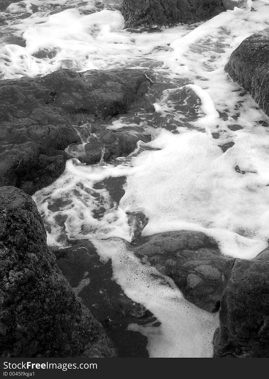 Surf and rocks on the seashore. Surf and rocks on the seashore