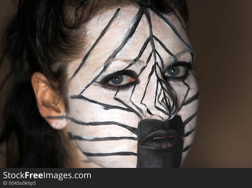 Portrait of the girl in zebra style makeup