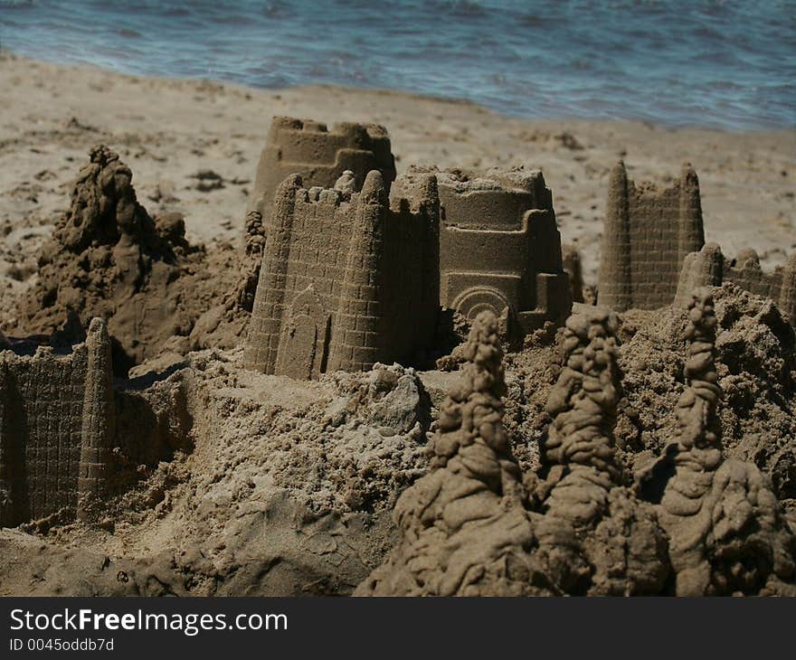 A sand castle on the beach. A sand castle on the beach