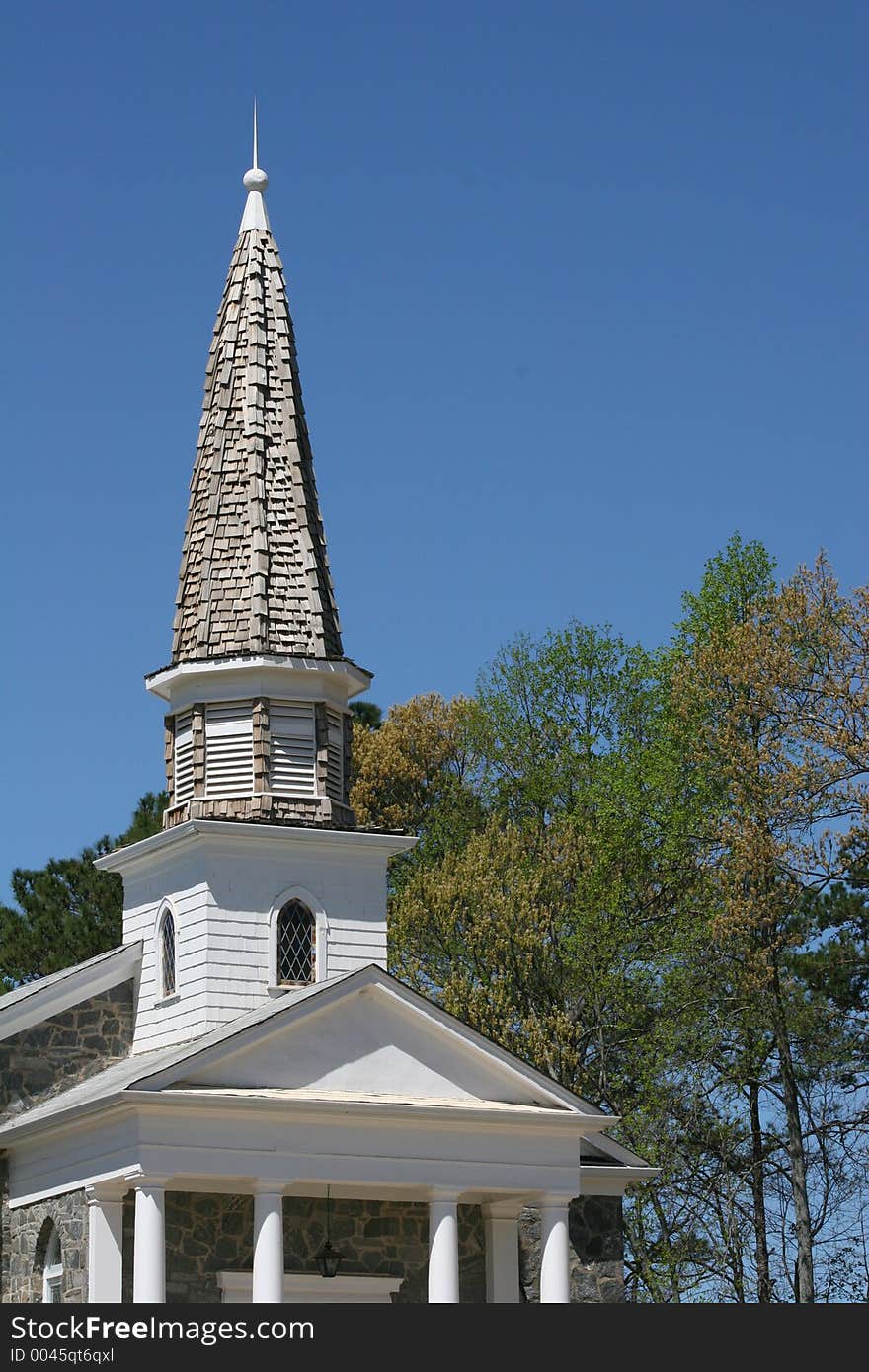 Church steeple made of wood shingles. Church steeple made of wood shingles