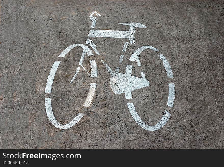 Bicycle track sign painted on the road