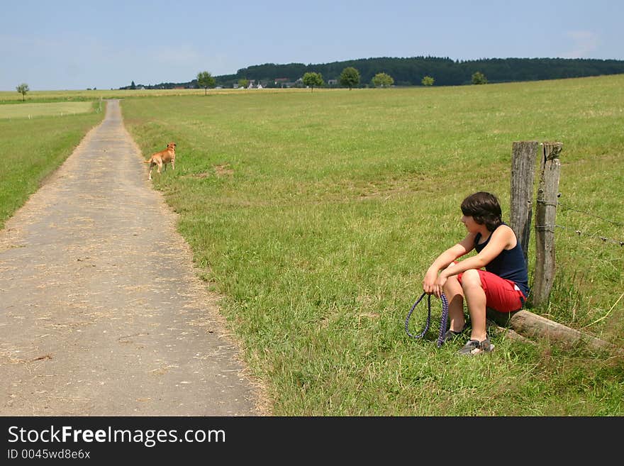 Young Boy With Her Dog