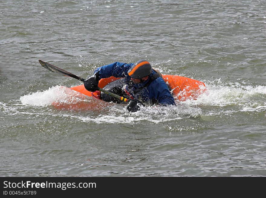 Kayaker practicing recovery from roll over. Kayaker practicing recovery from roll over