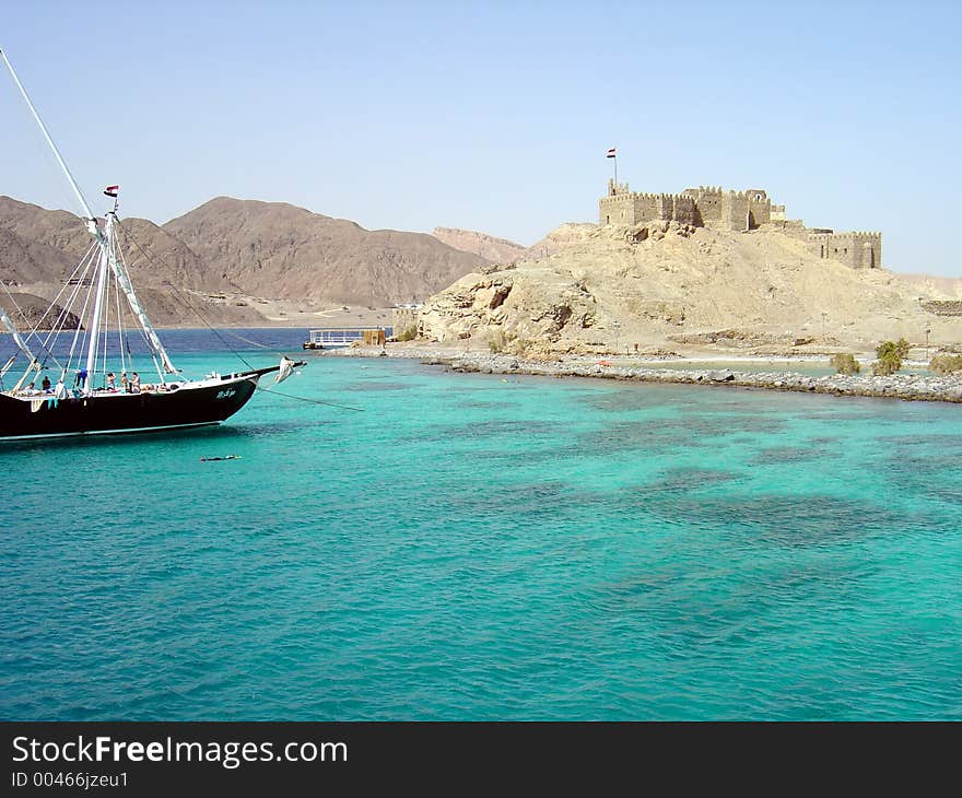 Snorkel boat moored by the old fort. Snorkel boat moored by the old fort