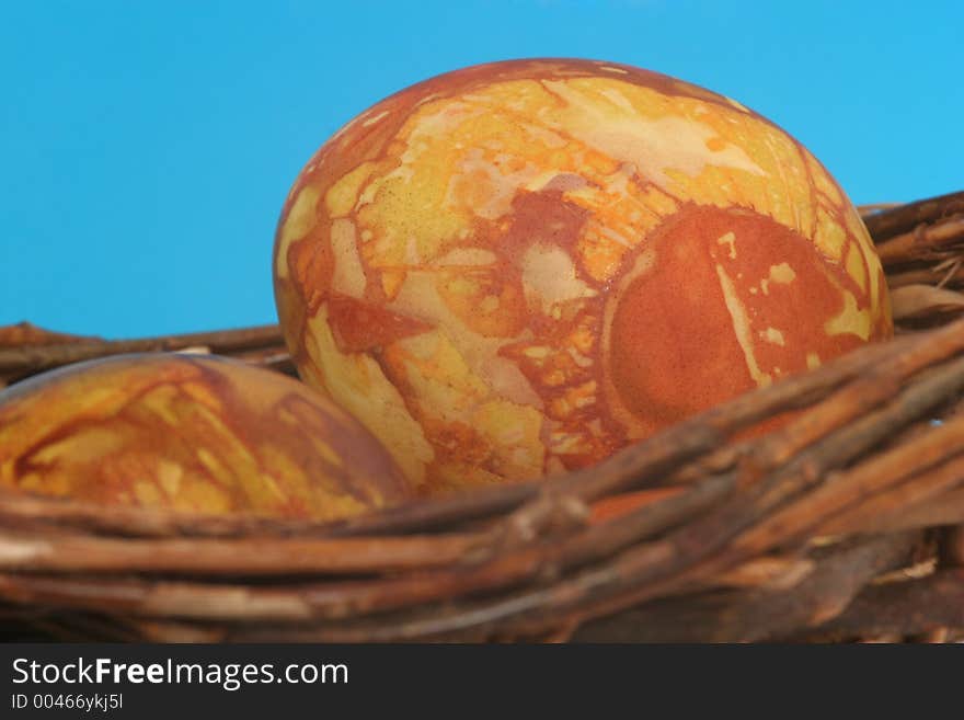 Cropped shot of easter eggs in basket. Cropped shot of easter eggs in basket