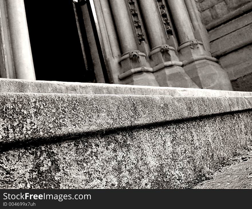 Close up of a stone step in from of church entrance. Close up of a stone step in from of church entrance.