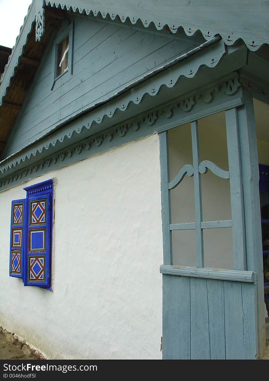 House with blue painted window. House with blue painted window