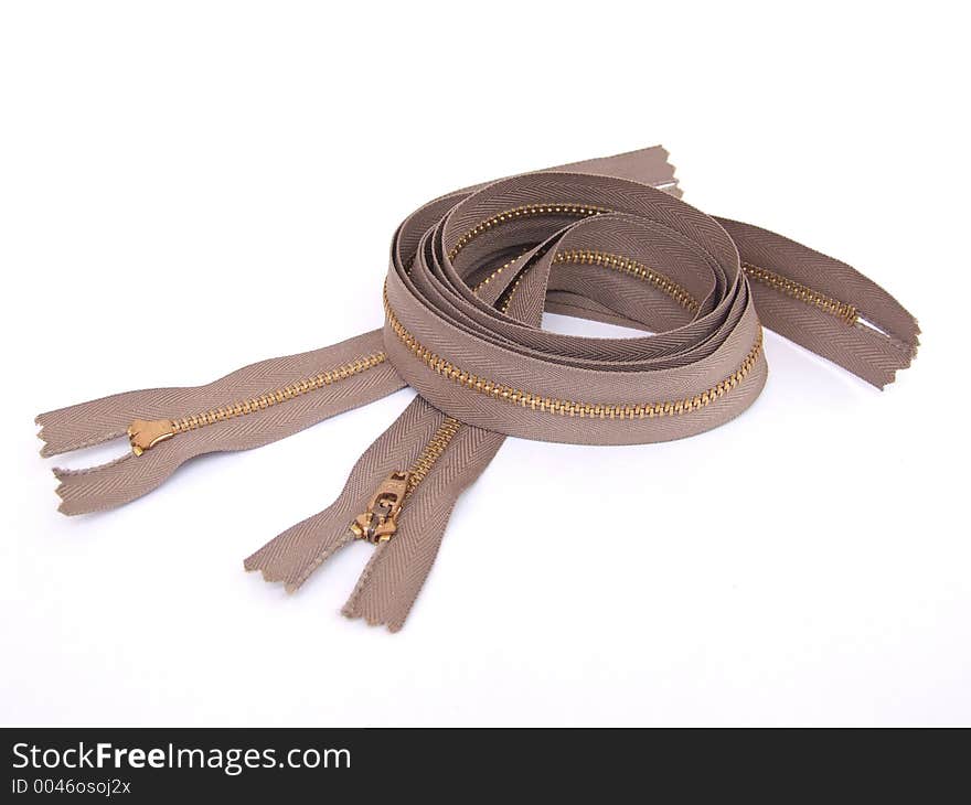 3 brown zippers