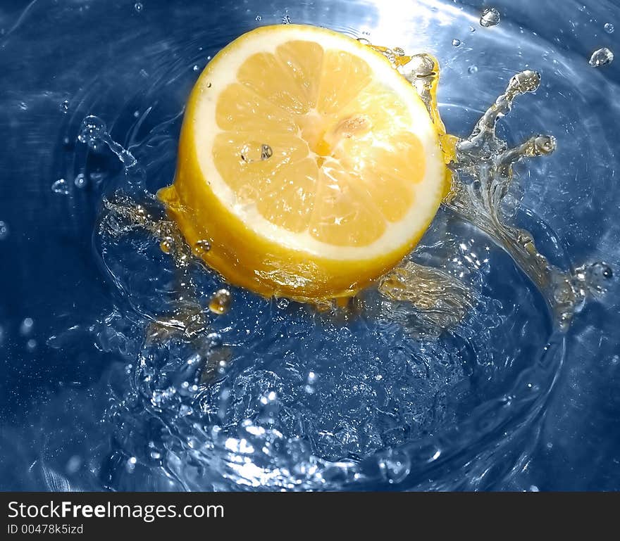 Lemon splashing water