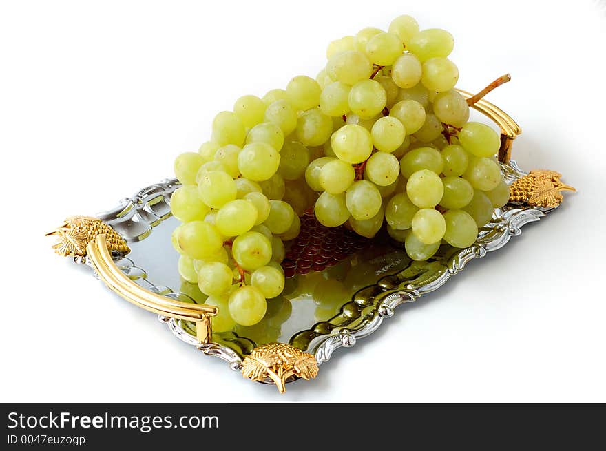 Green grapes on metal tray. Green grapes on metal tray