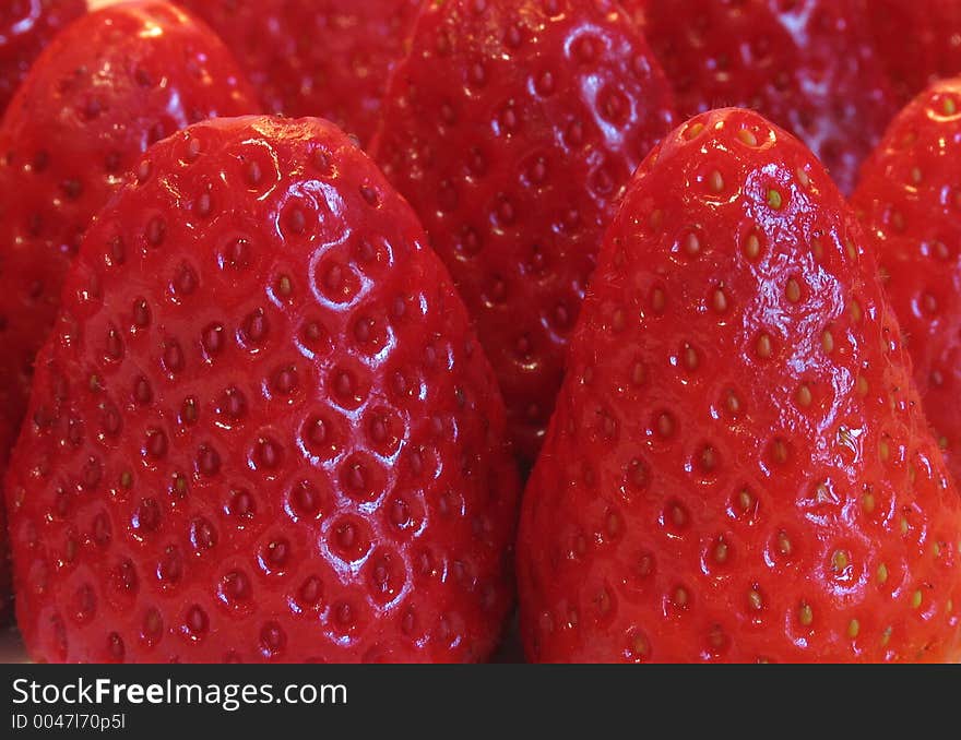 A group of strawberries, ready for eating. A group of strawberries, ready for eating.