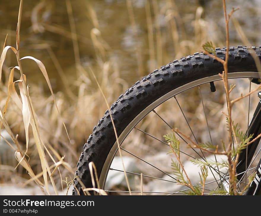 A mountain bike wheel in the outdoors