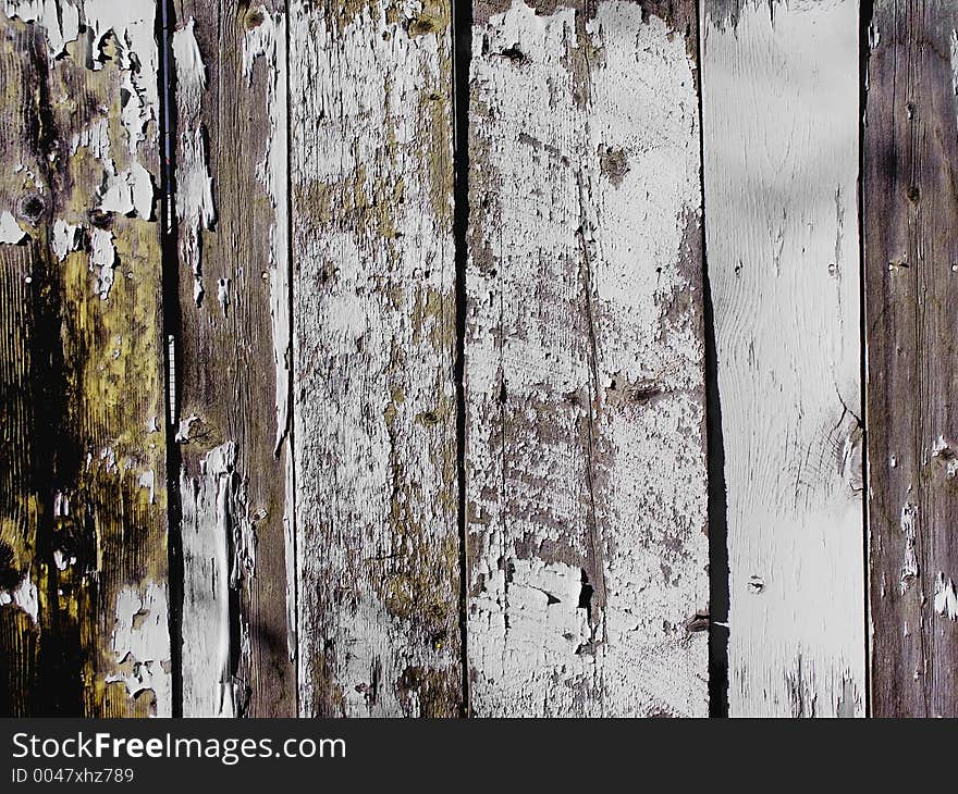 Old white fence with peeling paint