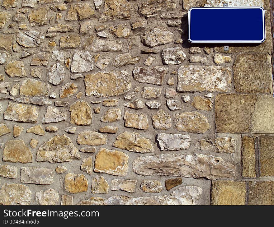 Wall With Street Name Sign