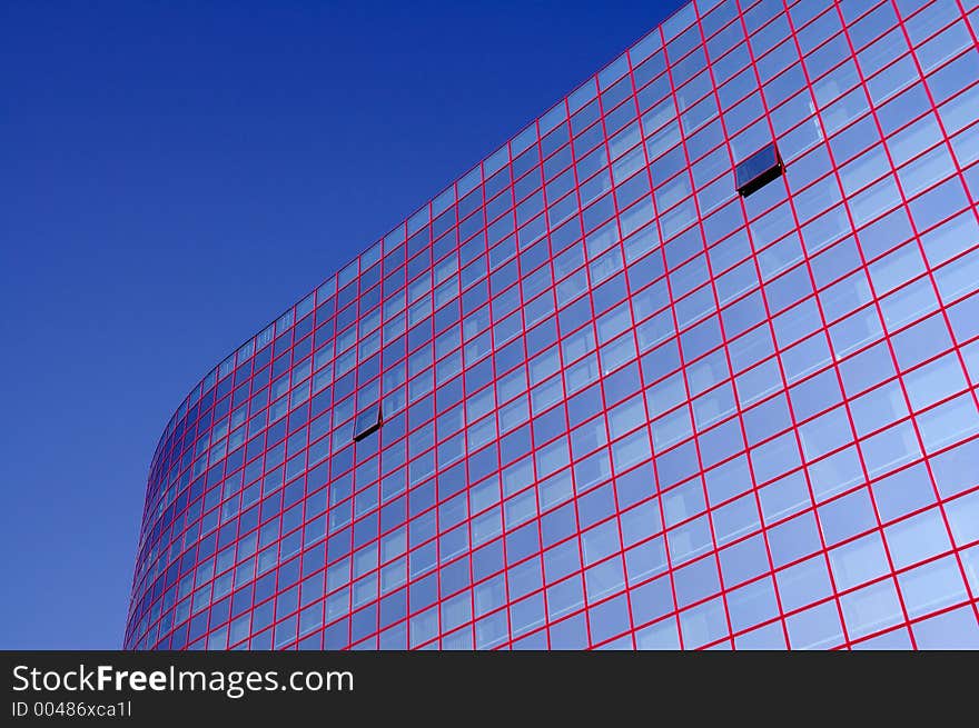 Glass building with red stripes. Glass building with red stripes