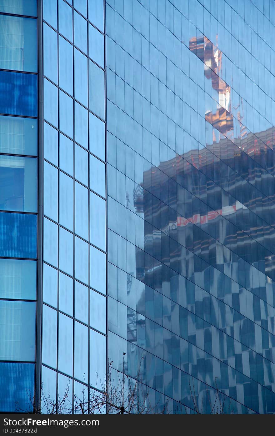 Reflestion of the crane in the blue windows. Reflestion of the crane in the blue windows.