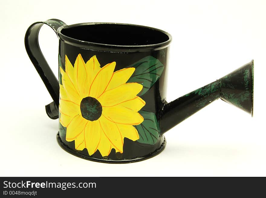 A garden watering can on a white background. A garden watering can on a white background