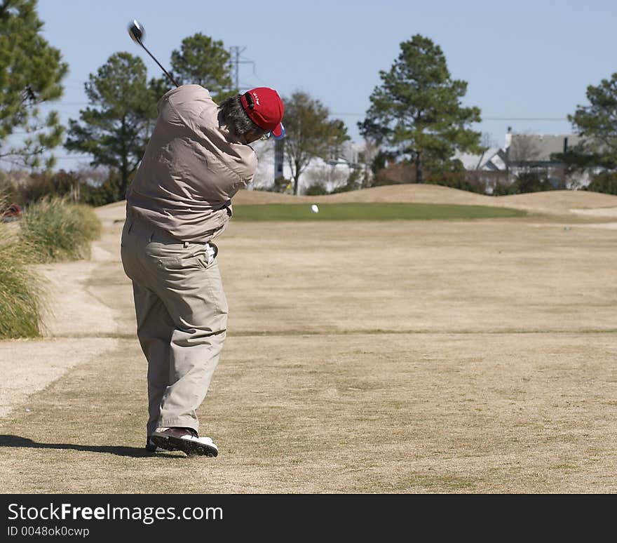 Golfer driving