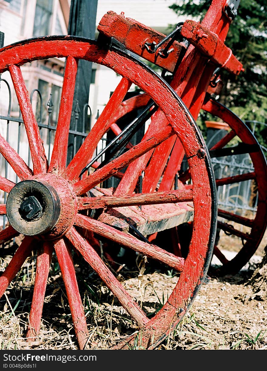 Two red wagon wheels