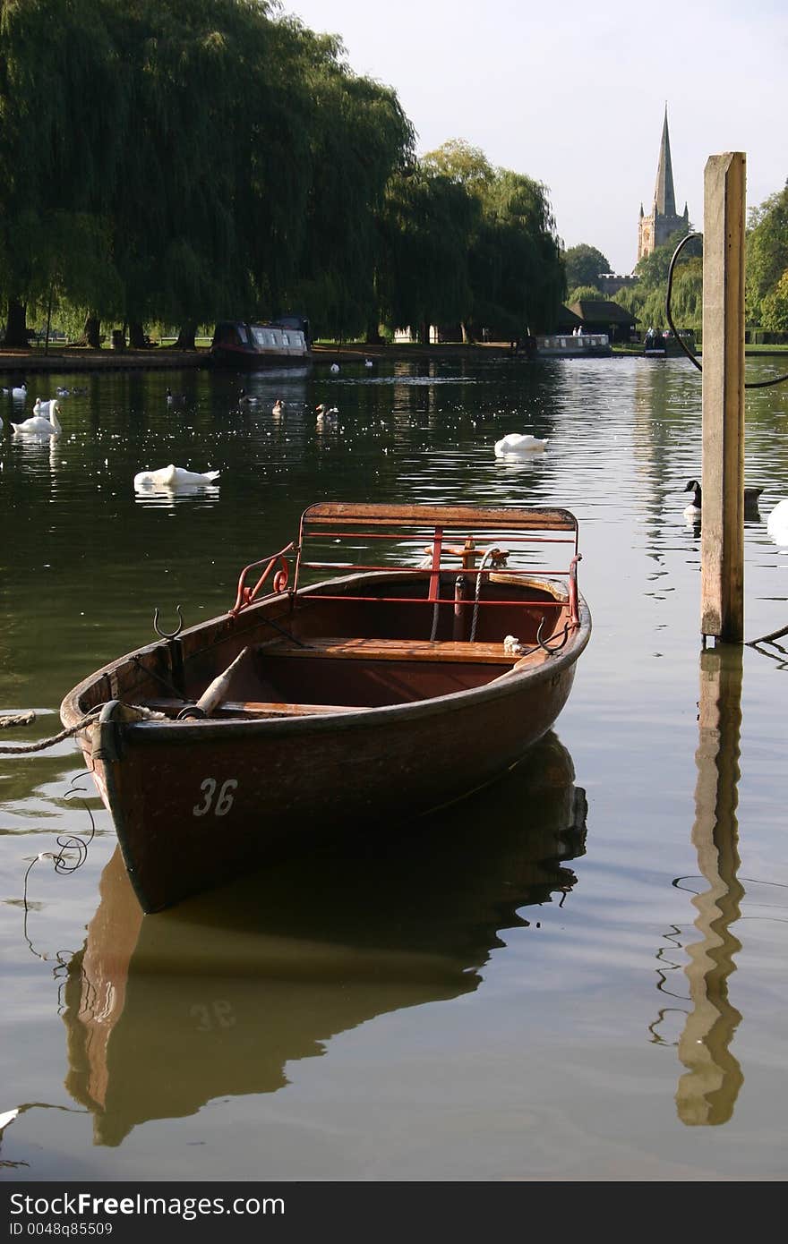 A little boat sitting on the river Avon in Stratford, England. Shakespeare was born in this town. A little boat sitting on the river Avon in Stratford, England. Shakespeare was born in this town.