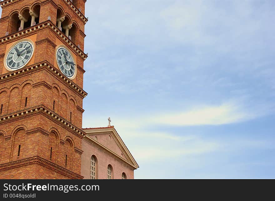 Church clock and blue sky