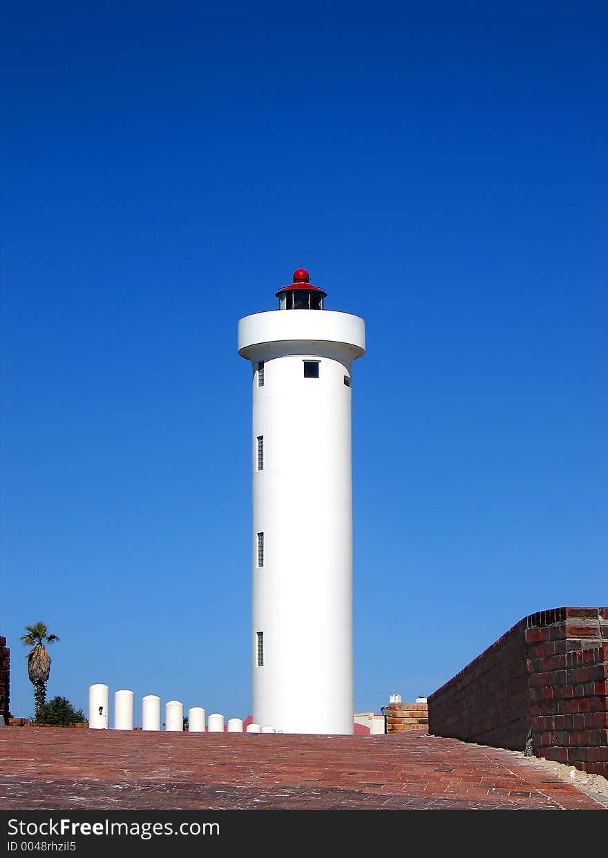 Portrait shot of a coastal lighthouse. Portrait shot of a coastal lighthouse.