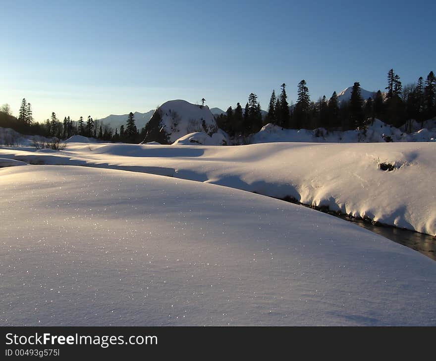 Sunny morning in Caucasus mountains in winter, Russia. Sunny morning in Caucasus mountains in winter, Russia