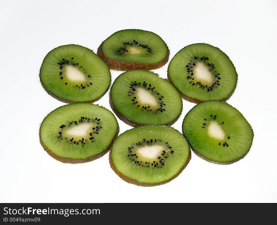 Kiwi slices over white