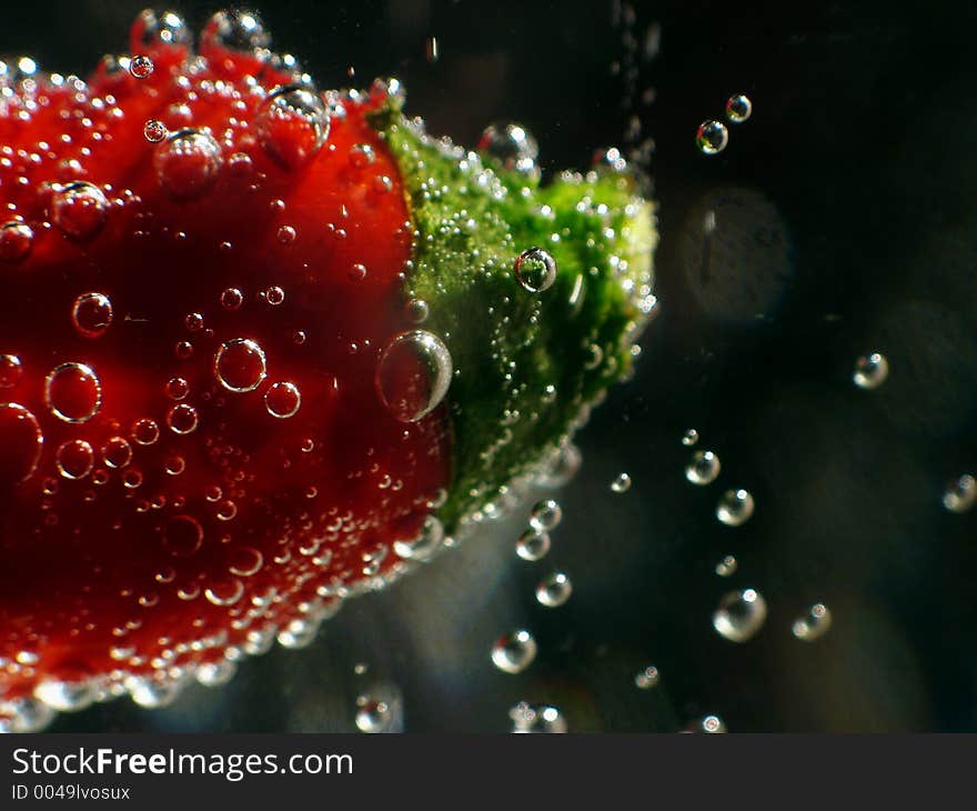 Bubbles in mineral water with pepper. Bubbles in mineral water with pepper