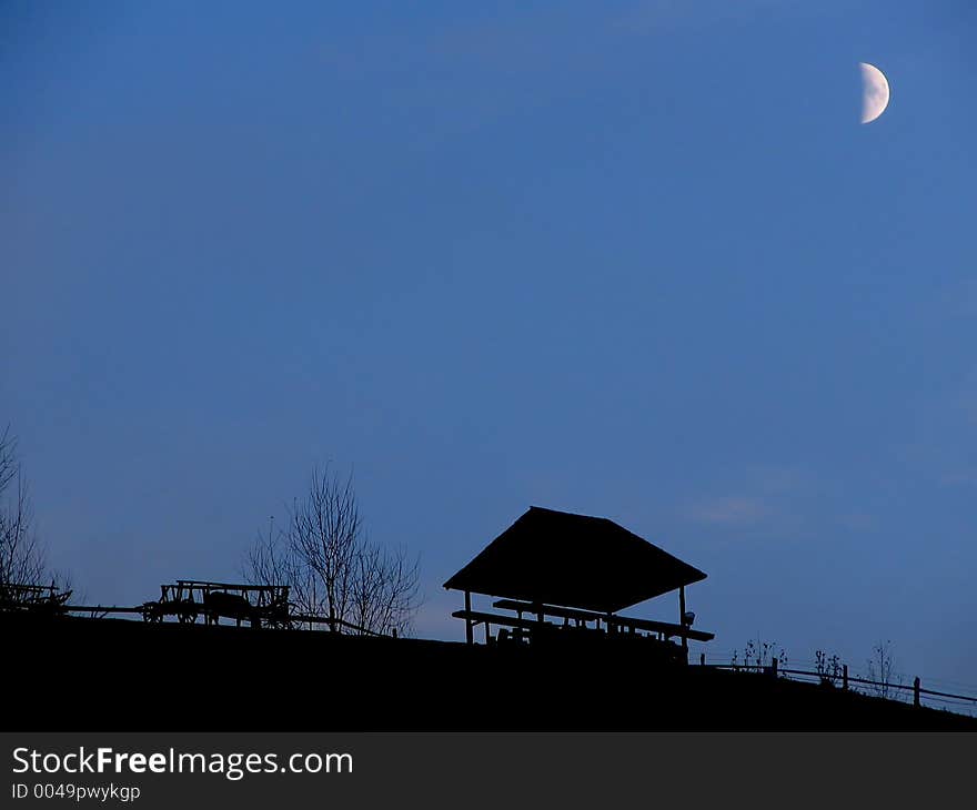 Evening landscape with dark blue sky and moon. Evening landscape with dark blue sky and moon