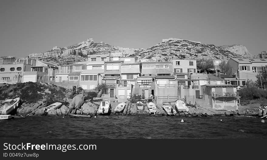 Black and white houses and small harbour at les goudes, marseille, france. Black and white houses and small harbour at les goudes, marseille, france