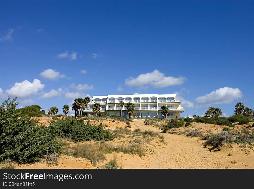 Luxury white Spanish hotel on the beach