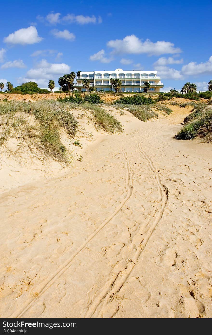 Luxury white Spanish hotel on the beach