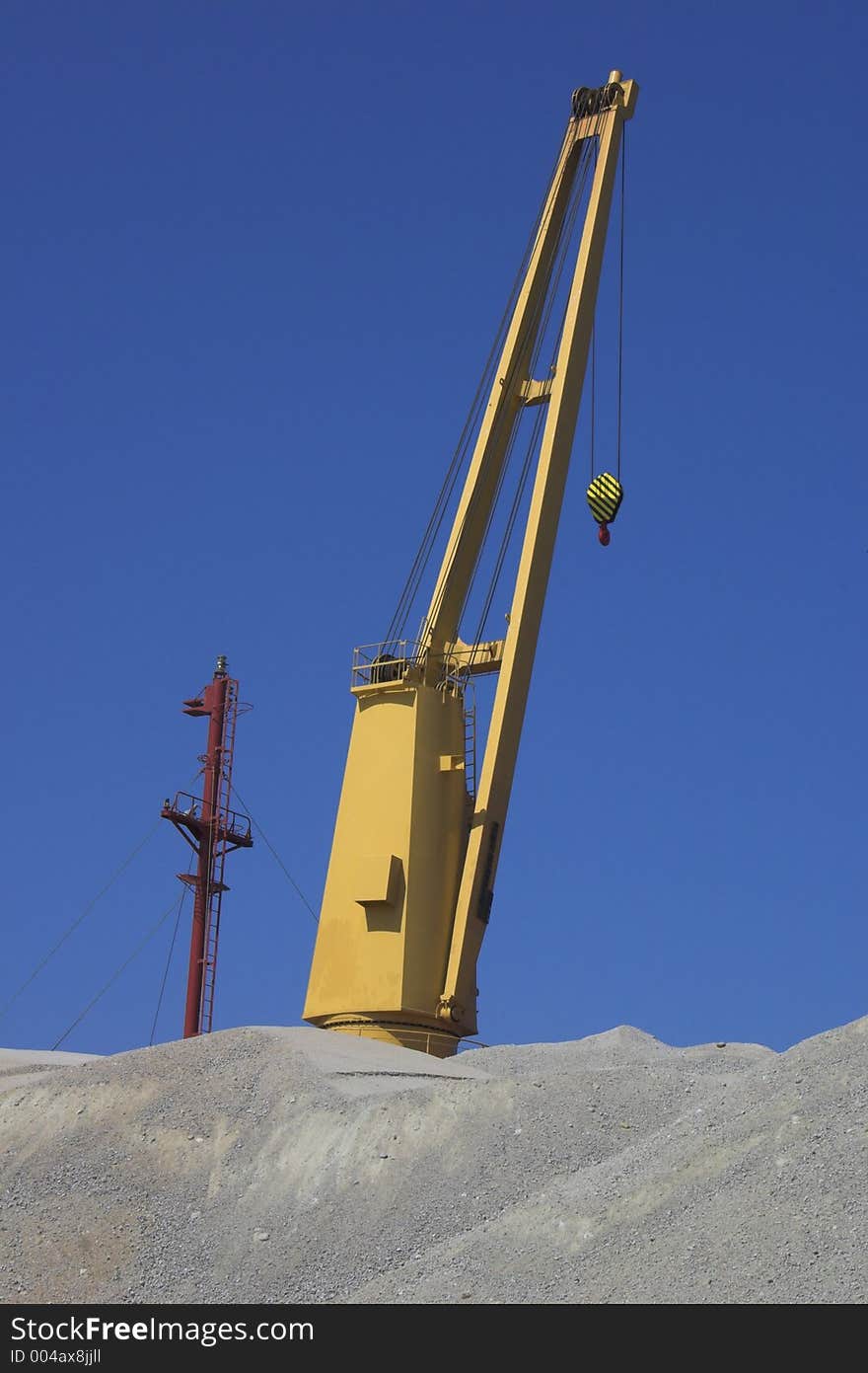 Yelow crane and blue sky. Yelow crane and blue sky