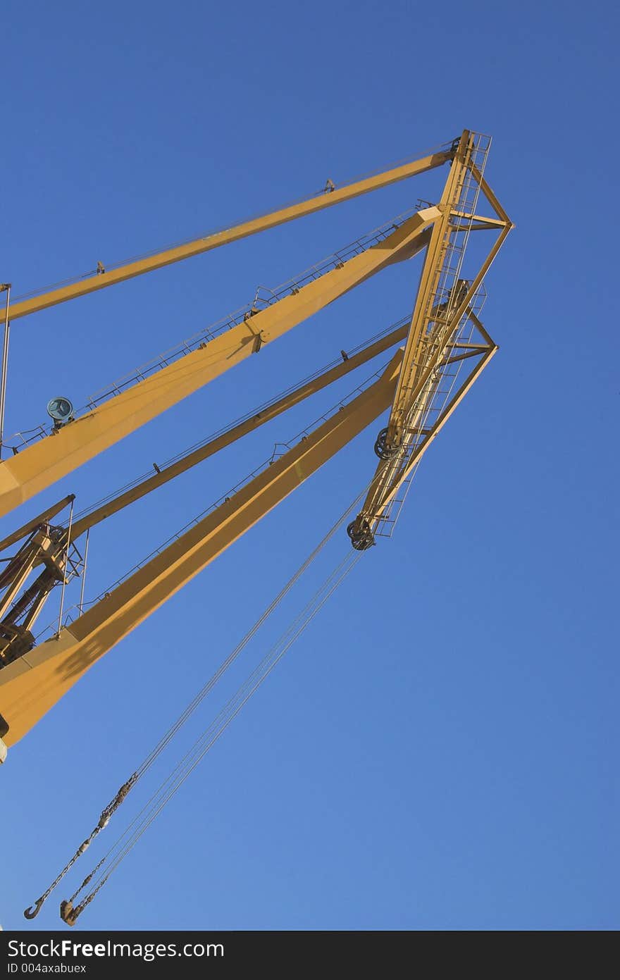 Yelow crane and blue sky. Yelow crane and blue sky