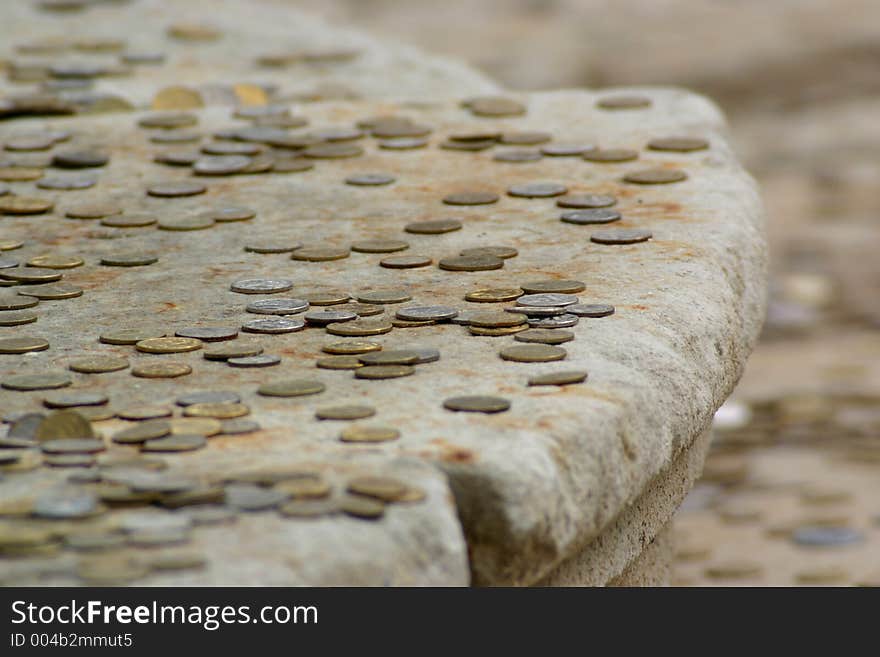 Coins on staircase on Red Square in Moscow