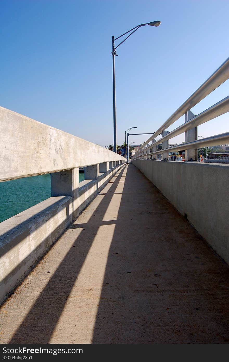 Concrete sidewalk on a bridge. Concrete sidewalk on a bridge