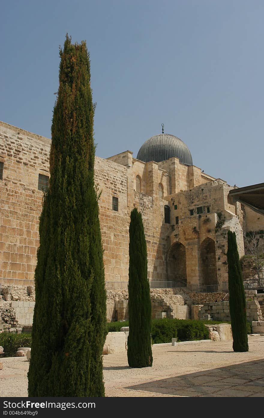 Ruins of Jerusalem old city wall as seen from the South East Corner,El Aqsa Mosque in the Background. Ruins of Jerusalem old city wall as seen from the South East Corner,El Aqsa Mosque in the Background