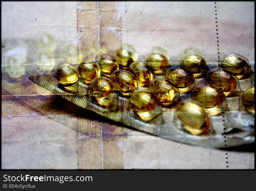 Homeopathic capsules on a grungy background