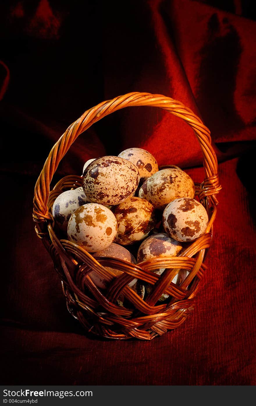 Easter quail eggs in a basket. Easter quail eggs in a basket