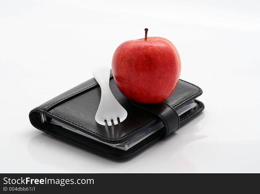 Apple and fork on filofax. Apple and fork on filofax