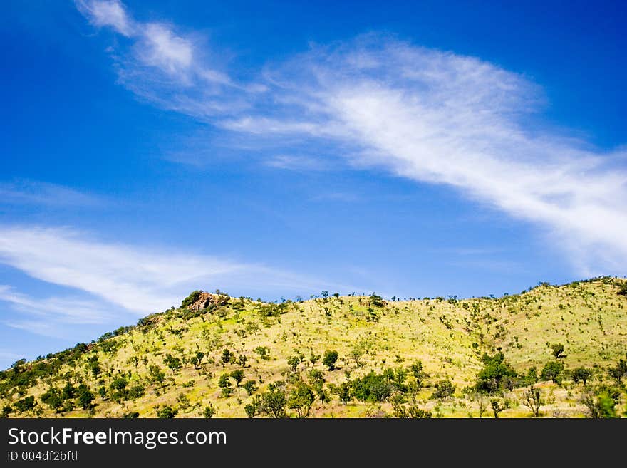 Landscape with green hills and blue skies. Landscape with green hills and blue skies