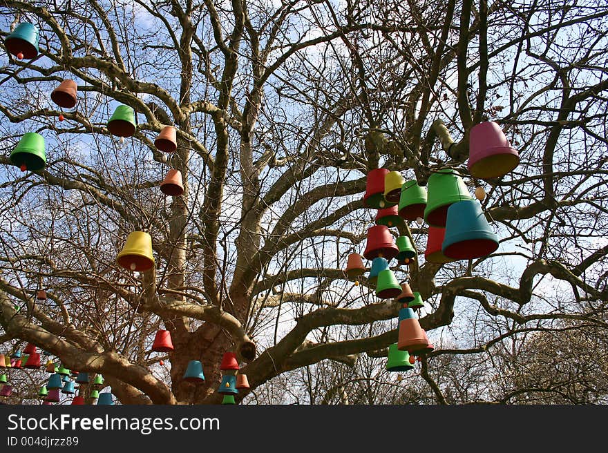 Easter clocks hanging in a tree