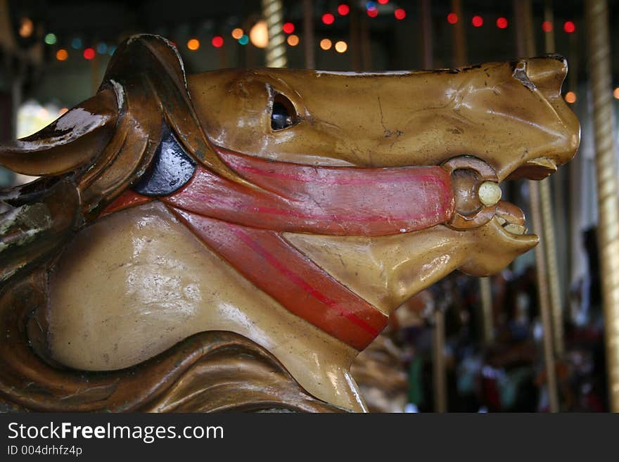 A close-up of a carousel horse head