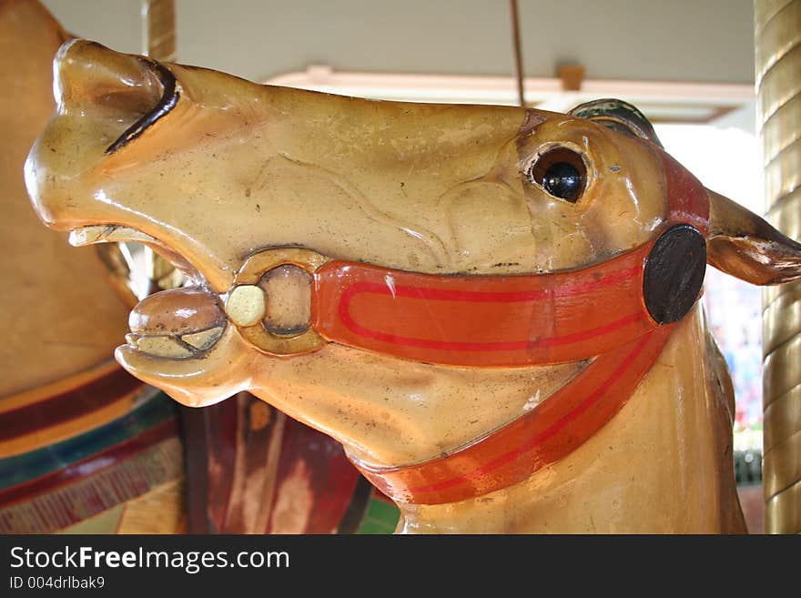 A close-up of a carousel horse head